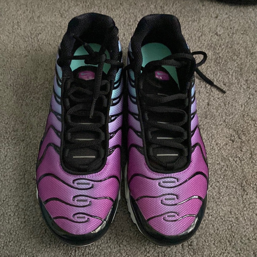 Nike Air. Mainly purple with a hint of light blue.